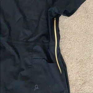 Januu Black scrubs with gold detail